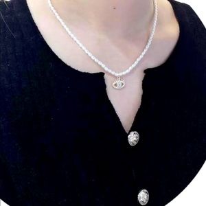 Evil eye pearl necklace